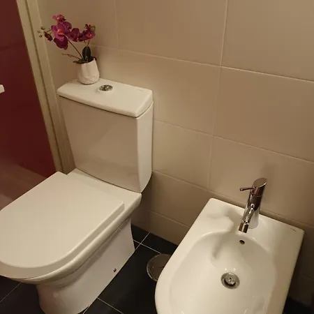 Quarto em Acomodações Particulares Casa Da Risca Amarela